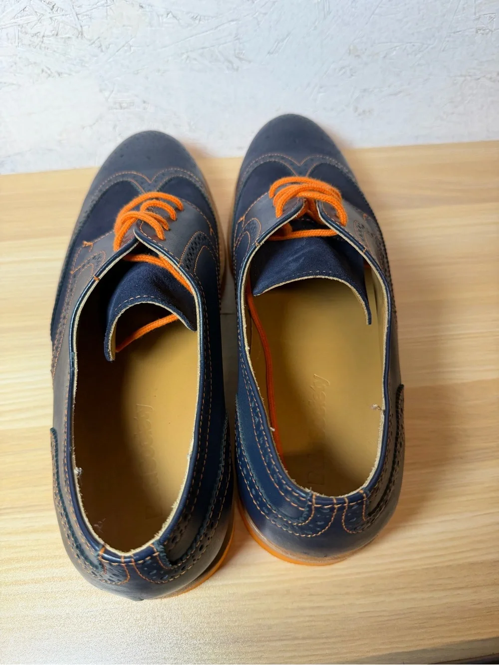 Bold Society Men's Navy Wingtip Oxfords with Orange Accents